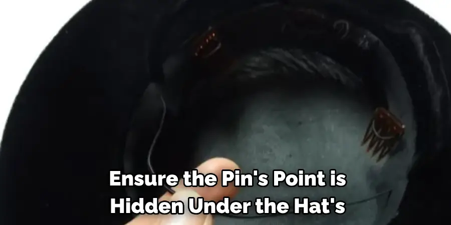 Ensure the Pin's Point is Hidden Under the Hat's