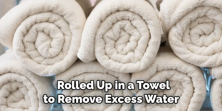Rolled Up in a Towel to Remove Excess Water