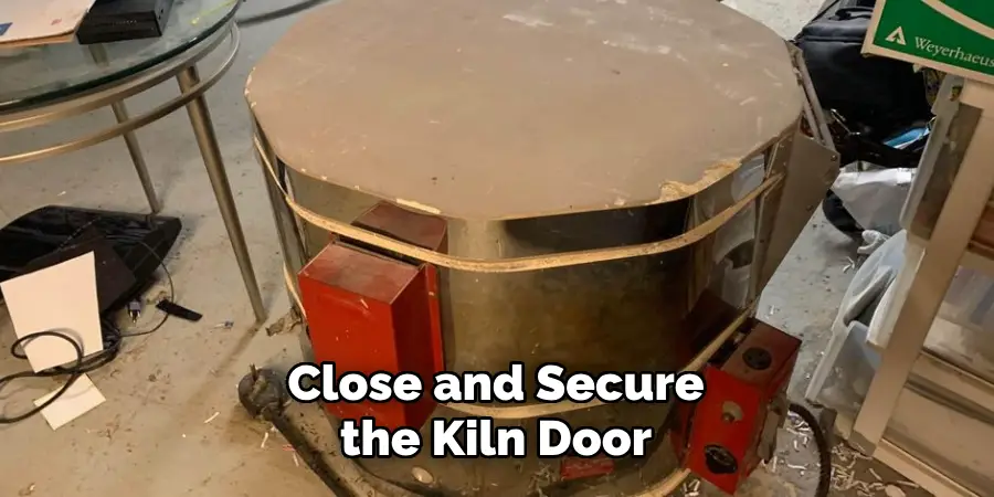 Close and Secure the Kiln Door