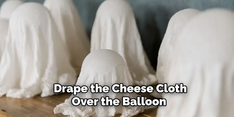 Drape the Cheese Cloth Over the Balloon