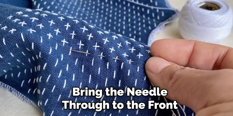 Bring the Needle Through to the Front