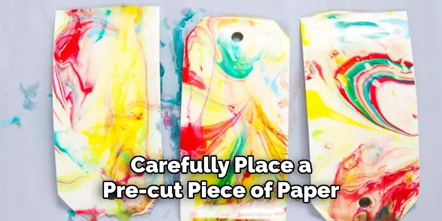 Carefully Place a Pre-cut Piece of Paper