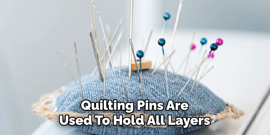 Quilting Pins Are Used To Hold All Layers
