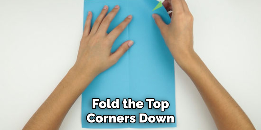 Fold the Top Corners Down