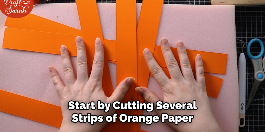 Start by Cutting Several Strips of Orange Paper