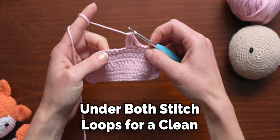 Under Both Stitch Loops for a Clean