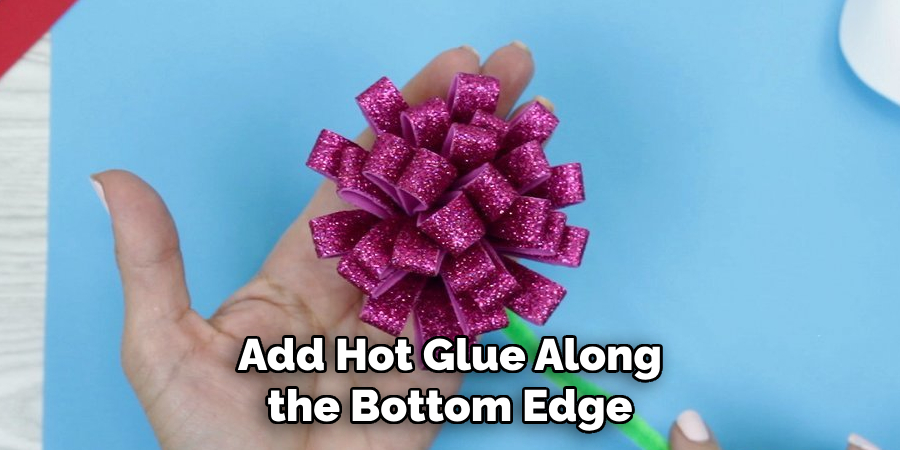 Add Hot Glue Along the Bottom Edge