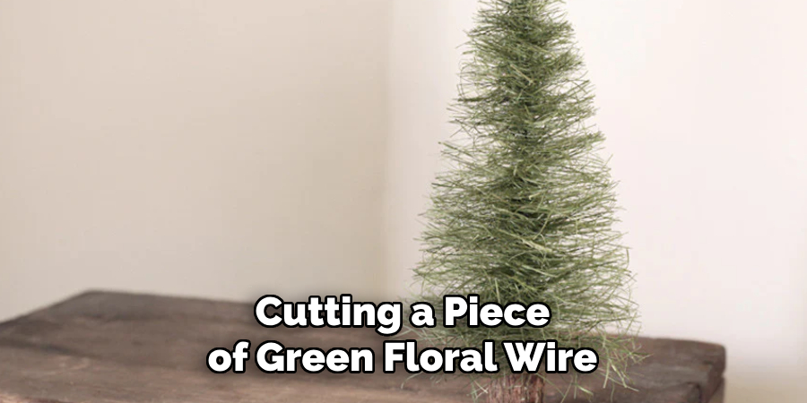 Cutting a Piece of Green Floral Wire