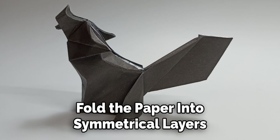 Fold the Paper Into Symmetrical Layers