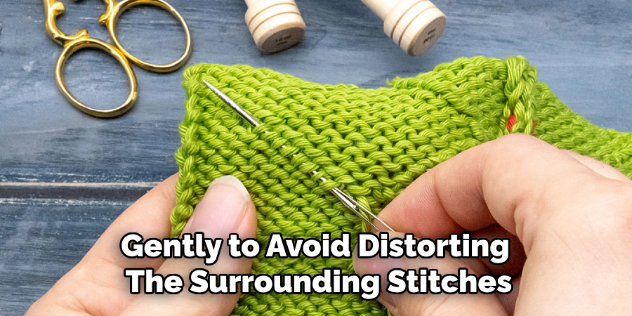 Gently to Avoid Distorting 
The Surrounding Stitches