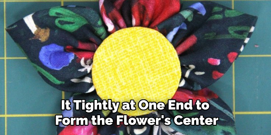 It Tightly at One End to
Form the Flower's Center
