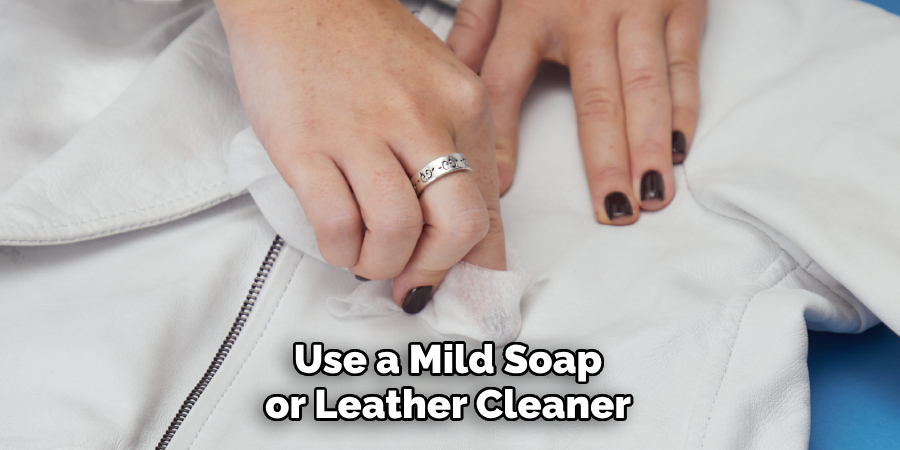 Use a Mild Soap or Leather Cleaner