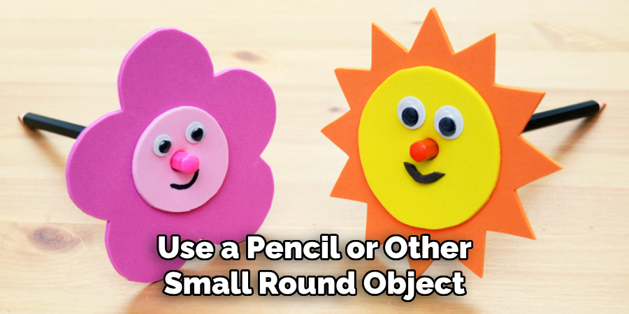 Use a Pencil or Other Small Round Object to Carefully Curl