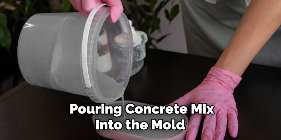 Pouring Concrete Mix
Into the Mold