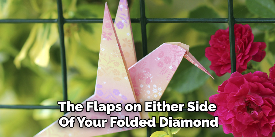 The Flaps on Either Side
Of Your Folded Diamond