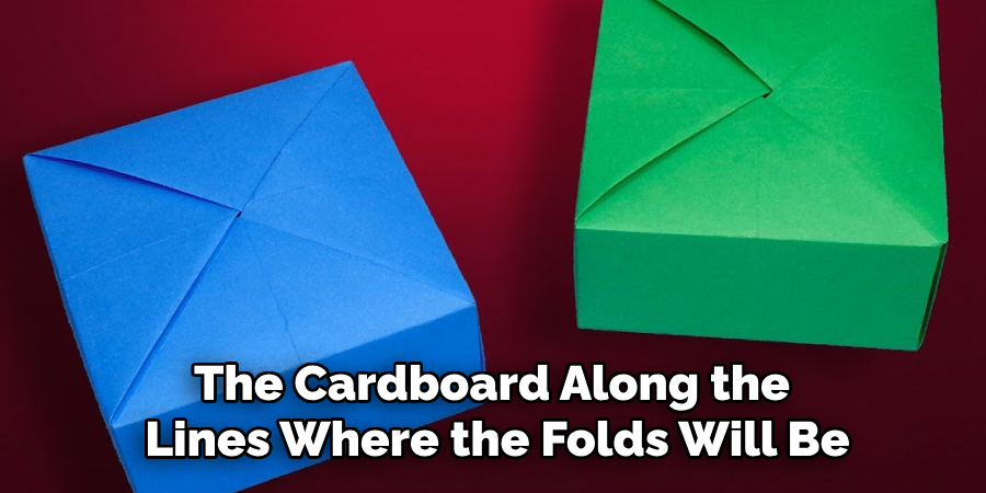 The Cardboard Along the
Lines Where the Folds Will Be