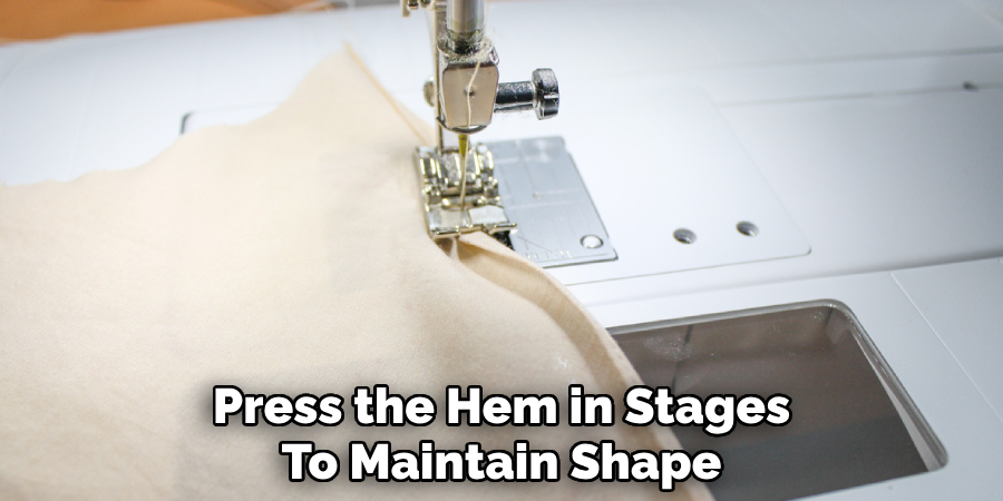 Press the Hem in Stages
To Maintain Shape