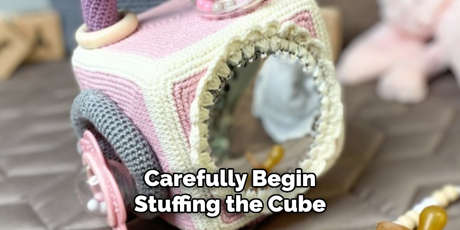 Carefully Begin Stuffing the Cube