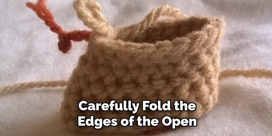 Carefully Fold the Edges of the Open