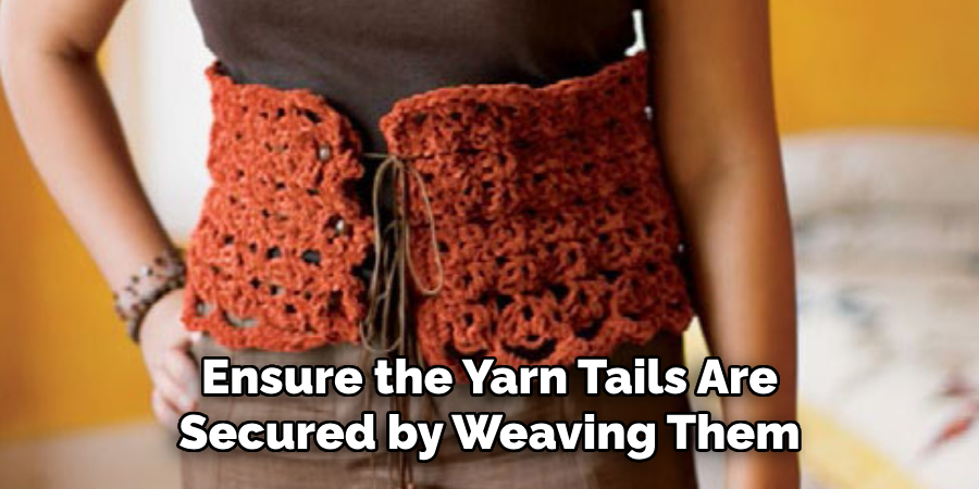 Ensure the Yarn Tails Are Secured by Weaving Them