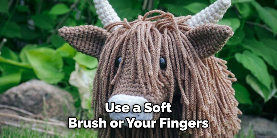 Use a Soft Brush or Your Fingers